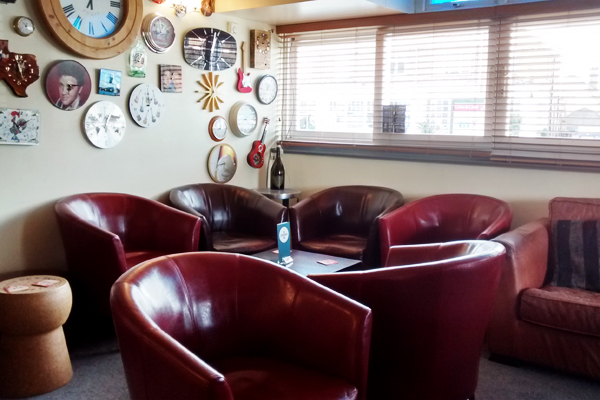 photo of the interior lounge area at the clockhouse bar